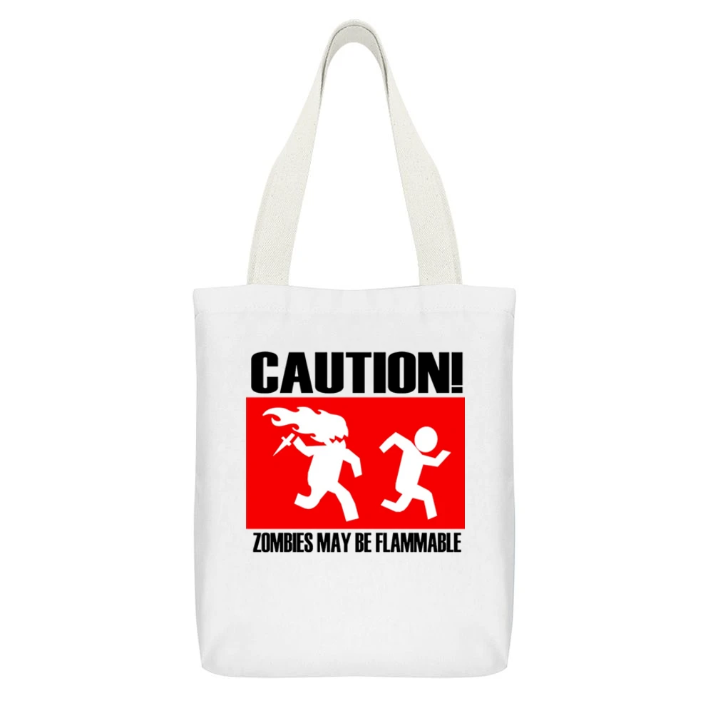 funny sign caution zombies may be flammable White Canvas Tote Shopping Bag With Interior Pocket